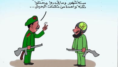 البرهان وعلي كرتي، كاريكاتير عمر دفع الله