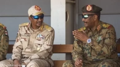 محمد حمدان دقلو وعبد الفتاح البرهان (أ.ف.ب)