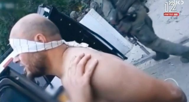 قائد مجموعة مقاتلين من القسام بعد تسليم نفسه إلى الجيش