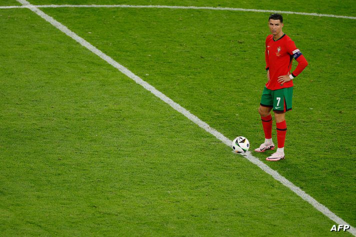 Portugal's forward #07 Cristiano Ronaldo looks on before the second half kick-off during the UEFA Euro 2024 quarter-final…